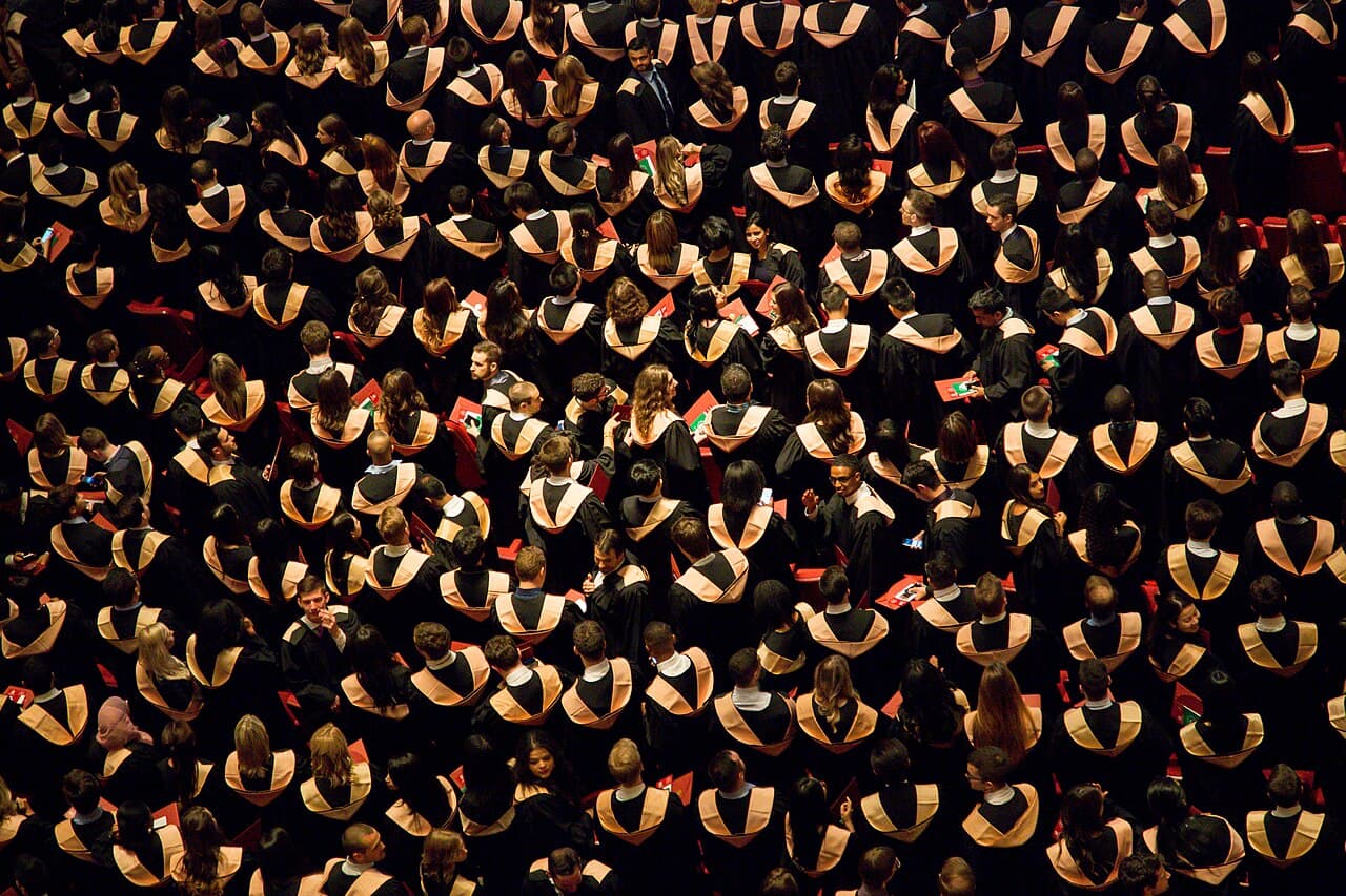 Graduates celebrating at a university ceremony